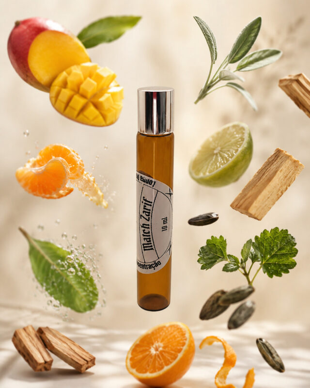 frasco âmbar de perfume roll on portátil posicionado vertical com elementos flutuantes ao redor manga tangerina fava tonka laranja limão hortelã